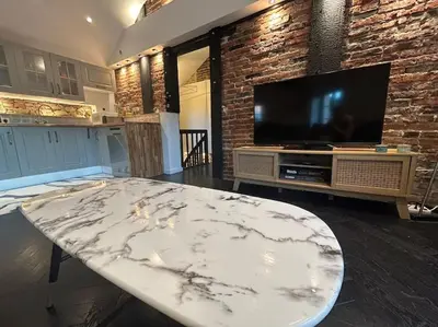 Cuisine ou kitchenette dans l'établissement Loft de standing