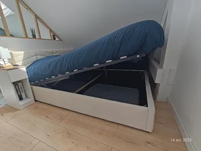 Un ou plusieurs lits dans un hébergement de l'établissement Suite Sous Velux T2
