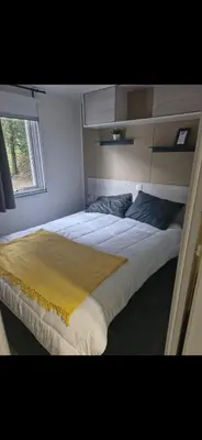 Un ou plusieurs lits dans un hébergement de l'établissement Superbe Mobil home proche de l'Océan