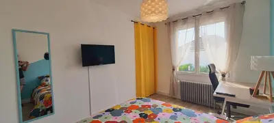 Un ou plusieurs lits dans un hébergement de l'établissement La maison ocre - chambre turquoise