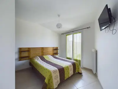 Un ou plusieurs lits dans un hébergement de l'établissement Maison pour 4 entre plages et marais salants