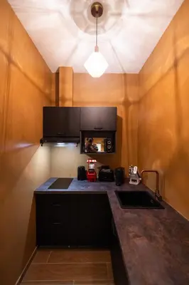 Cuisine ou kitchenette dans l'établissement Dreamy Room - Evasion, balnéo & cinéma privé