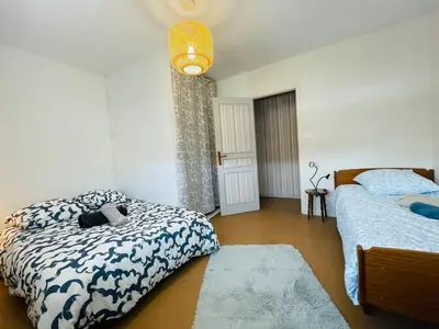 Un ou plusieurs lits dans un hébergement de l'établissement Casa Spacieuse