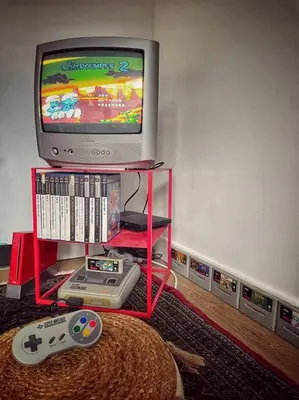 Télévision ou salle de divertissement dans l'établissement Le repère du voyageur