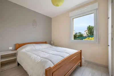 Un ou plusieurs lits dans un hébergement de l'établissement Maison de plain-pied - quartier calme pour six personnes