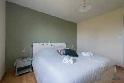 Un ou plusieurs lits dans un hébergement de l'établissement Maison rénovée proche mer