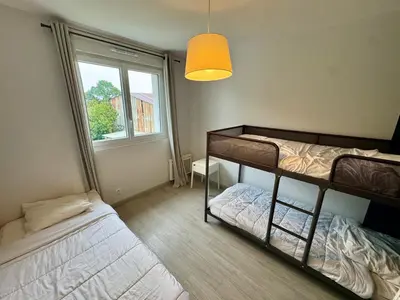 Un ou plusieurs lits dans un hébergement de l'établissement Domaine des 5 Roses - Rose Sombre