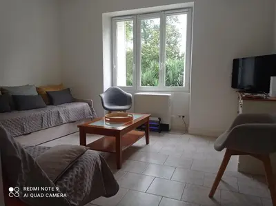 Télévision ou salle de divertissement dans l'établissement Repos au bord de l'eau