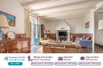 Coin salon dans l'établissement Villa de famille pour 13 à 200m de la mer