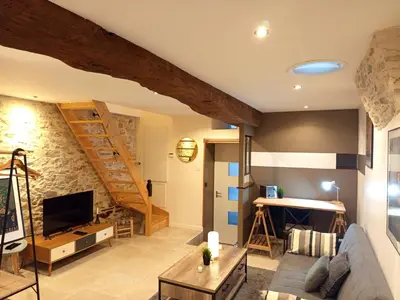 Coin salon dans l'établissement Escale - Maison - Nantes aéroport
