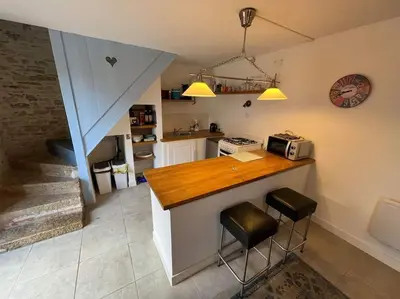 Cuisine ou kitchenette dans l'établissement Courtyard cosy cottage