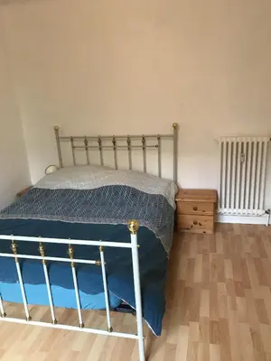 Un ou plusieurs lits dans un hébergement de l'établissement Appartement proche Quai de la Fosse