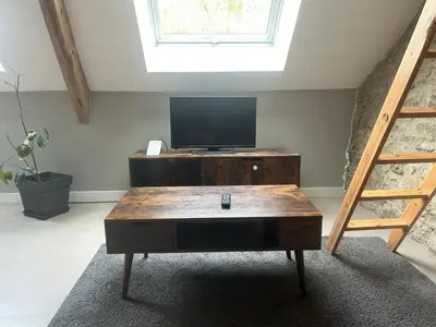 Télévision ou salle de divertissement dans l'établissement Séjour au Domaine des mortiers