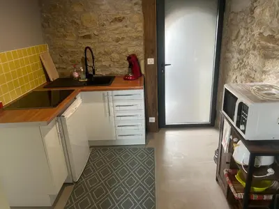 Cuisine ou kitchenette dans l'établissement Séjour au Domaine des mortiers