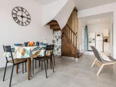 Coin salon dans l'établissement Maison rénovée avec wifi, centre bourg de St Mars la Jaille - FR-1-306-1289