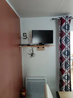Télévision ou salle de divertissement dans l'établissement MH F101 Camping Bois Masson