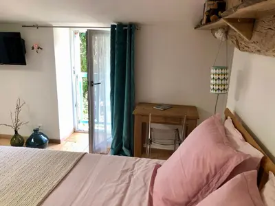 Un ou plusieurs lits dans un hébergement de l'établissement Gîte le Saint Couette 4 étoiles, charme & confort chic