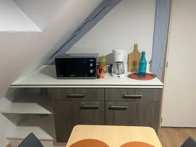 Cuisine ou kitchenette dans l'établissement Le Saint-Georges