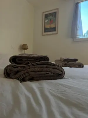 Un ou plusieurs lits dans un hébergement de l'établissement Appartement d'Exception à 20m de la Plage Votre Évasion Parfaite
