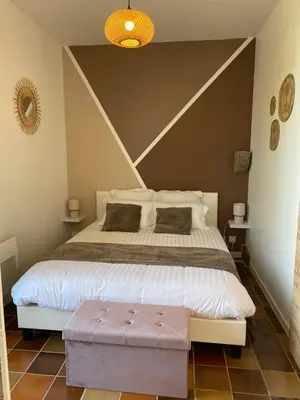 Un ou plusieurs lits dans un hébergement de l'établissement L'Origami - Domaine de la Houblette