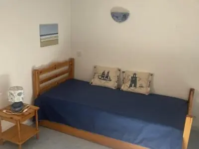 Un ou plusieurs lits dans un hébergement de l'établissement Maison accueillante à Saint Jean de Monts avec piscine collective - FR-1-323-553