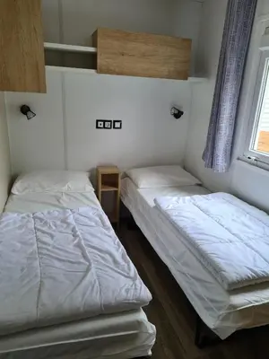 Un ou plusieurs lits dans un hébergement de l'établissement Bungalow confortable à Saint-Jean-de-Monts - 45 m²