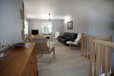 Coin salon dans l'établissement Maison avec piscine 10 couchages