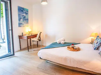 Un ou plusieurs lits dans un hébergement de l'établissement Villa Ker Rohan by Interhome
