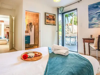 Un ou plusieurs lits dans un hébergement de l'établissement Villa Ker Rohan by Interhome