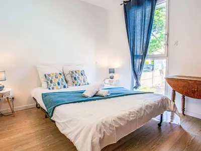 Un ou plusieurs lits dans un hébergement de l'établissement Villa Ker Rohan by Interhome