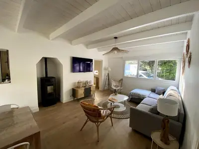 Coin salon dans l'établissement Maison familiale dans les pins à 500m de la plage