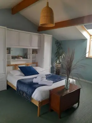 Un ou plusieurs lits dans un hébergement de l'établissement Maison spacieuse proche Nantes 7 personnes