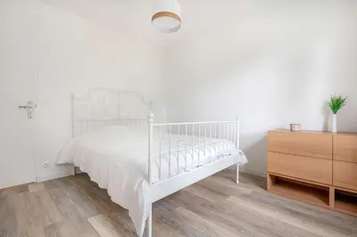 Un ou plusieurs lits dans un hébergement de l'établissement Maison pour 6 à 900m de la plage