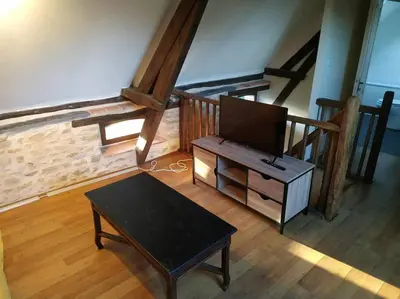 Coin salon dans l'établissement Petite maison à la campagne