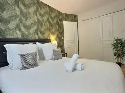 Un ou plusieurs lits dans un hébergement de l'établissement Confort et convivialité au rendez-vous, Centre Angers-Musset