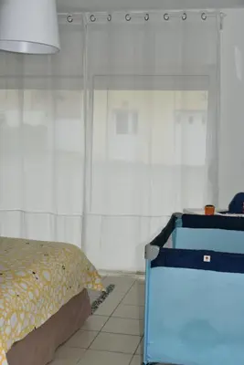 Un ou plusieurs lits dans un hébergement de l'établissement Maison douillette à 600m de la plage
