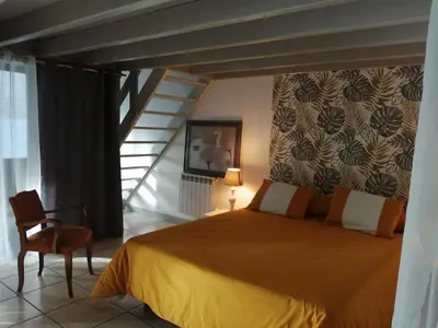 Un ou plusieurs lits dans un hébergement de l'établissement Loft la Forge