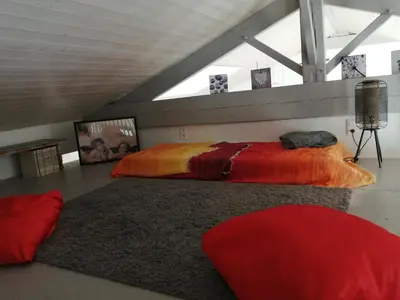 Un ou plusieurs lits dans un hébergement de l'établissement Loft la Forge