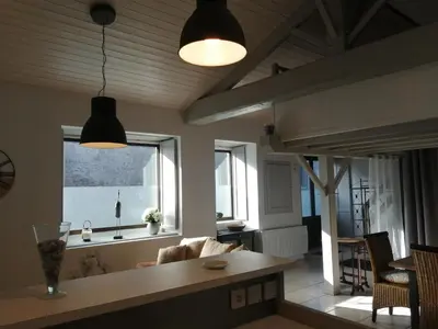 Coin salon dans l'établissement Loft la Forge