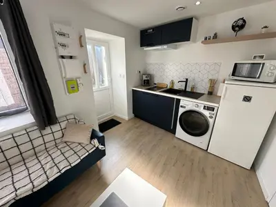 Cuisine ou kitchenette dans l'établissement Belle Maison de ville neuve
