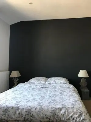Un ou plusieurs lits dans un hébergement de l'établissement Maison pecheur dans le banzeau