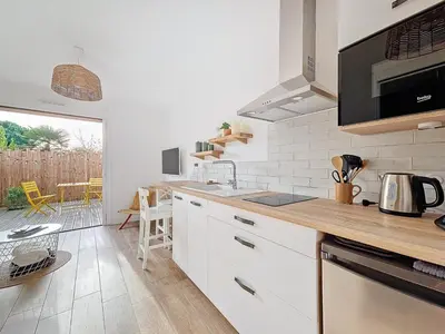 Cuisine ou kitchenette dans l'établissement Charmant studio Bernerie-en-Retz