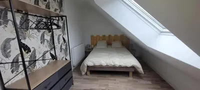 Un ou plusieurs lits dans un hébergement de l'établissement Maison confortable à Casson, 60 m², bien équipée