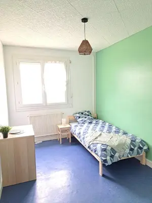 Un ou plusieurs lits dans un hébergement de l'établissement Colocation 6 chambres - hôpital - Marcel Callo