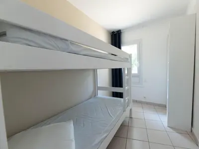 Un ou plusieurs lits dans un hébergement de l'établissement Maison 2 chambres