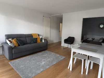 Coin salon dans l'établissement Ker Maretz Appartement lumineux entre côte et parc