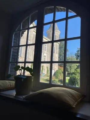 Un ou plusieurs lits dans un hébergement de l'établissement Château Doré les Tours - Appartement Loup - Proche Puy du Fou