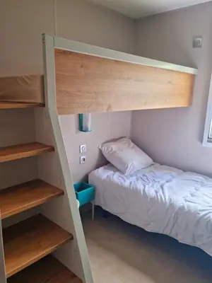 Un ou plusieurs lits dans un hébergement de l'établissement MOBILHOME 6p 3 CH 2 SDB SAINT JEAN DE MONTS