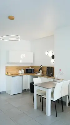 Cuisine ou kitchenette dans l'établissement Le Standing, hyper centre T2