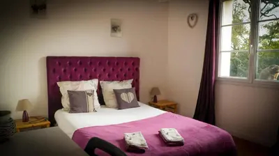 Un ou plusieurs lits dans un hébergement de l'établissement Chambre d'hôtes Sous Les Grands Chênes LOVE